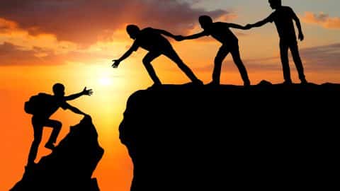 Teamwork friendship hiking help each other